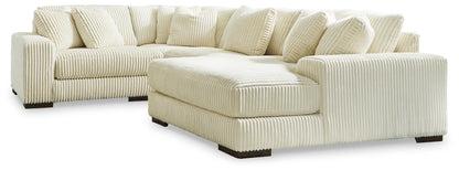 Pines Furniture Outlet - Ashley Furniture - Lindyn Sectional - RAF 4-Piece Sectional with Chaise / Ivory - 21104S15