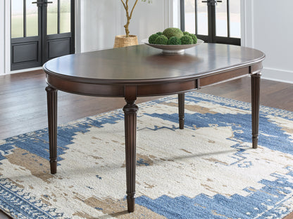 Pines Furniture Outlet - Ashley Furniture - Lavinton Dining Room - Oval Dining Room EXT Table / Brown - D764-35
