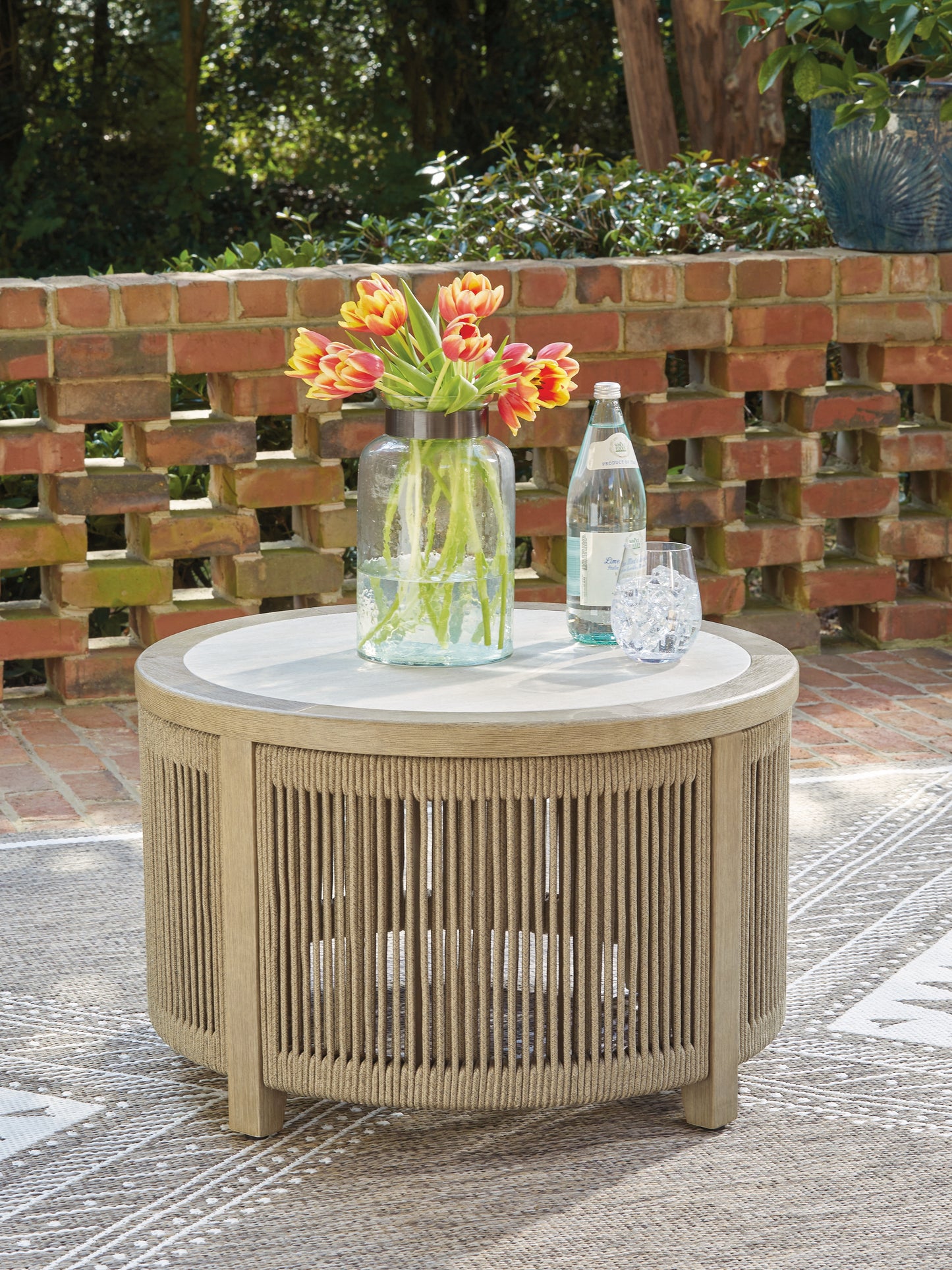 Pines Furniture Outlet - Ashley Furniture - Spooners Cove Outdoor - Round Cocktail Table / Beige - PCP469-708