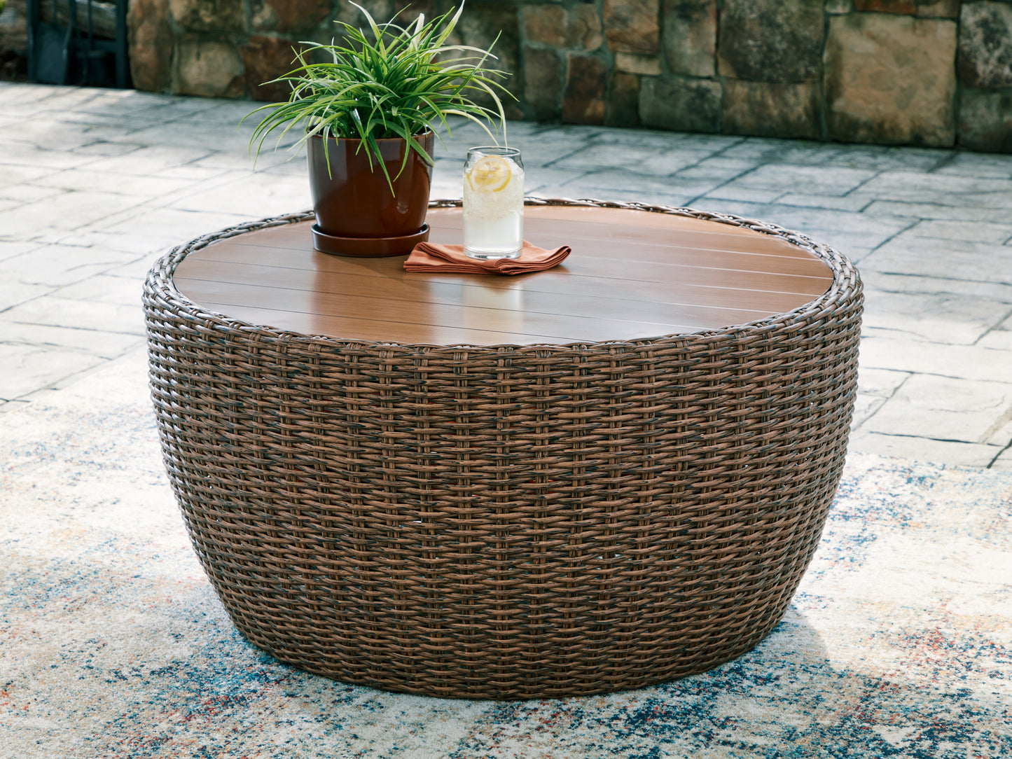 Pines Furniture Outlet - Ashley Furniture - Double Point Outdoor - Round Cocktail Table / Beige - PCP503-708