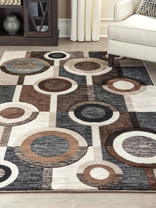 Pines Furniture Outlet - Ashley Furniture - Guintte Rug - 5' x 6'7" Rug / Multi - R403972