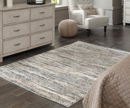 Pines Furniture Outlet - Ashley Furniture - Gizela Rug - 5'3" x 7'3" Rug / Ivory/Beige/Gray - R404862