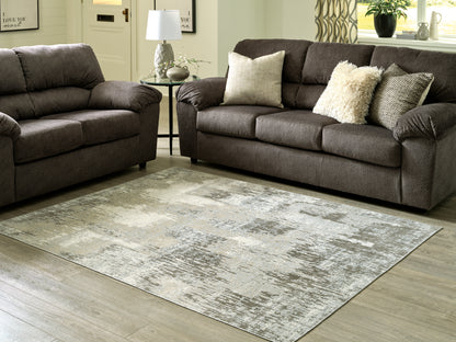 Pines Furniture Outlet - Ashley Furniture - Arriston Rug - 7'10" x 10' Washable Rug / Multi - R405561