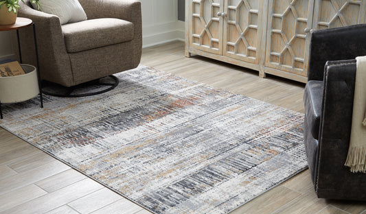 Pines Furniture Outlet - Ashley Furniture - Rhettner Rug - 5'3" x 7'3" Rug / Multi - R406072
