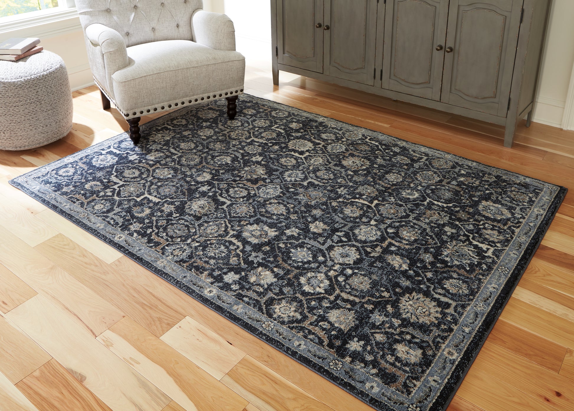 Pines Furniture Outlet - Ashley Furniture - Hilcott Rug - 5'3" x 7'3" Rug / Blue/Cream/Brown - R406112