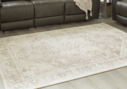 Pines Furniture Outlet - Ashley Furniture - Gatwell Rug - 5' x 7' Rug / Ivory/Gray/Tan - R406512
