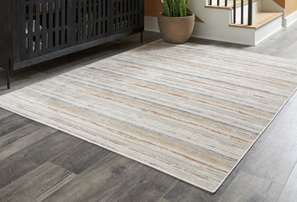 Pines Furniture Outlet - Ashley Furniture - Artney Rug - 5' x 7' Rug / Multi - R407022