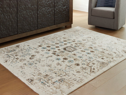 Pines Furniture Outlet - Ashley Furniture - Jossler Rug - 8' x 10' Rug / Ivory/Brown/Teal - R407071