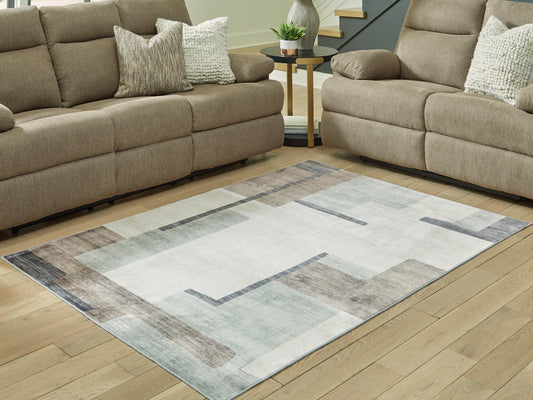 Pines Furniture Outlet - Ashley Furniture - Larkport Rug - Washable 5' x 7' Area Rug / Cream/Brown/Gray - R407412