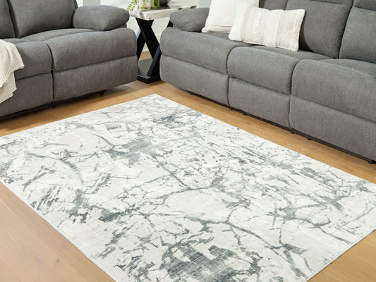 Pines Furniture Outlet - Ashley Furniture - Tobinbury Rug - Washable 8' x 10' Area Rug / Gray - R407421
