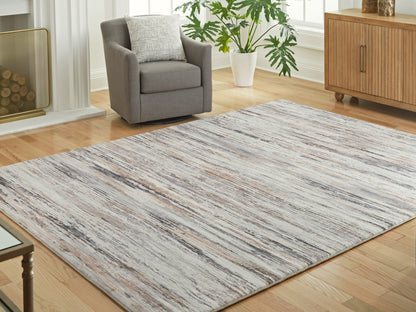 Pines Furniture Outlet - Ashley Furniture - Nace Rug - 5' x 7' Area Rug / Gray/Brown/White - R407472