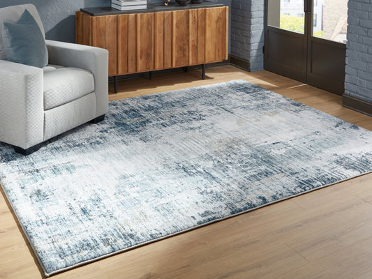 Pines Furniture Outlet - Ashley Furniture - Arlenmont Rug - 5' x 7' Area Rug / Blue/White/Brown - R407482