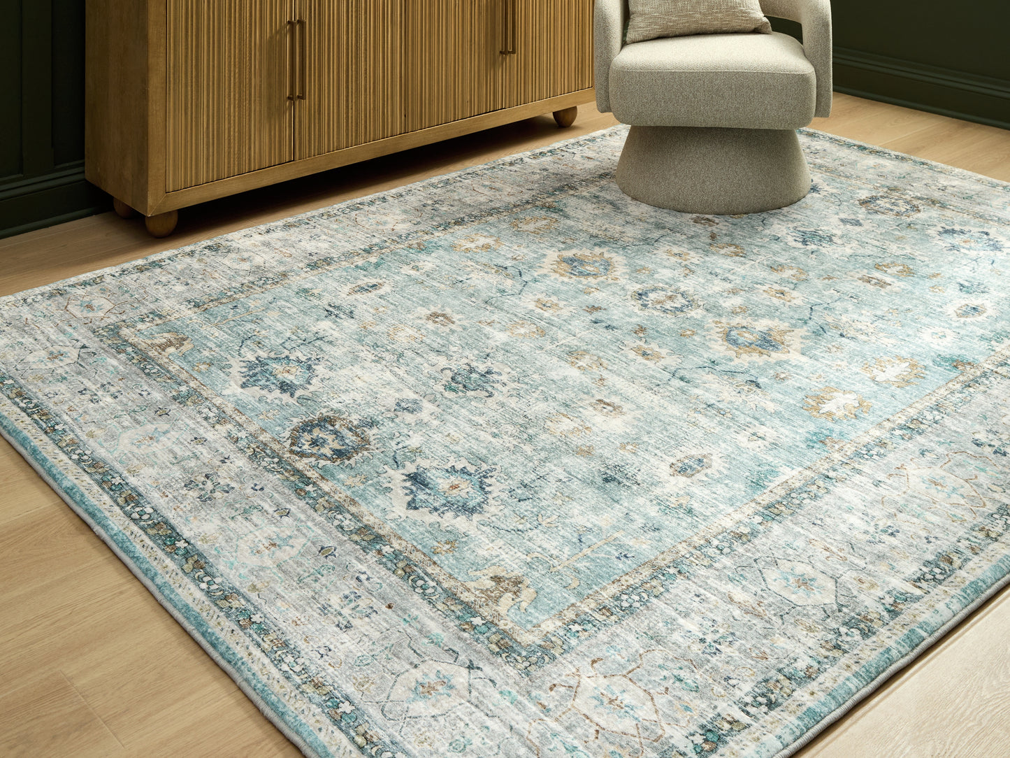 Pines Furniture Outlet - Ashley Furniture - Ladstoney Rug - 7'6" x 9'6" Area Rug / Teal/Beige/Ochre - R407501