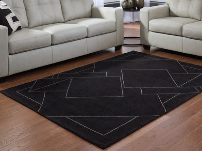 Pines Furniture Outlet - Ashley Furniture - Marav Rug - 5' x 7' Area Rug / Black/White - R407532