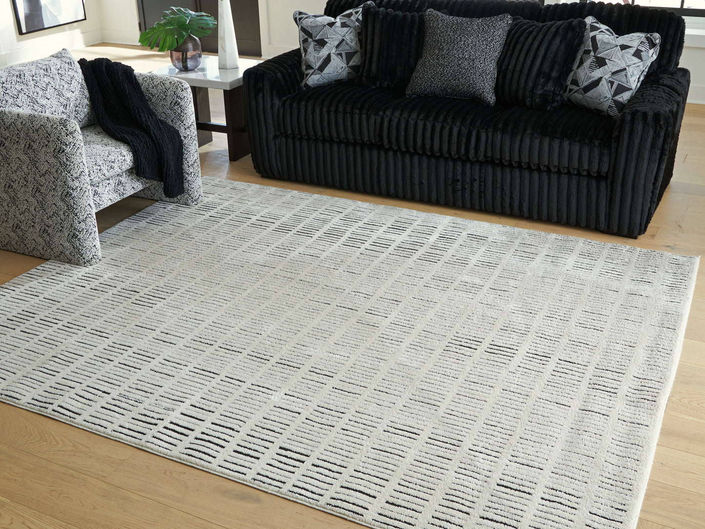 Pines Furniture Outlet - Ashley Furniture - Turinwith Rug - 5'3" x 7' Area Rug / Ivory/Black - R407552