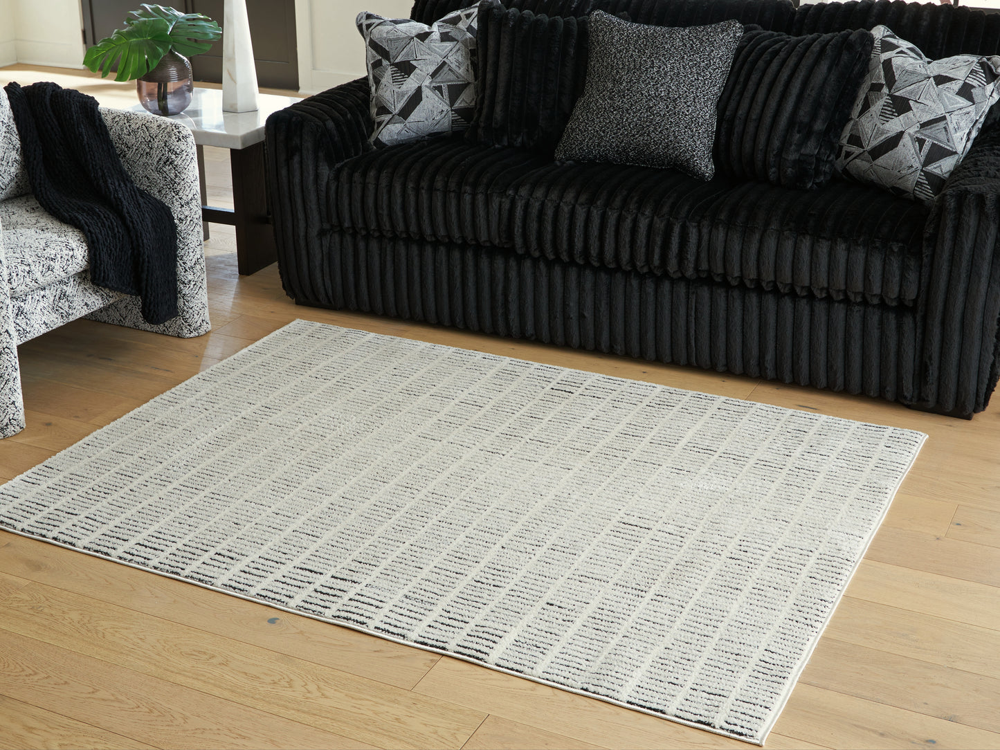 Pines Furniture Outlet - Ashley Furniture - Turinwith Rug - 5'3" x 7' Area Rug / Ivory/Black - R407552