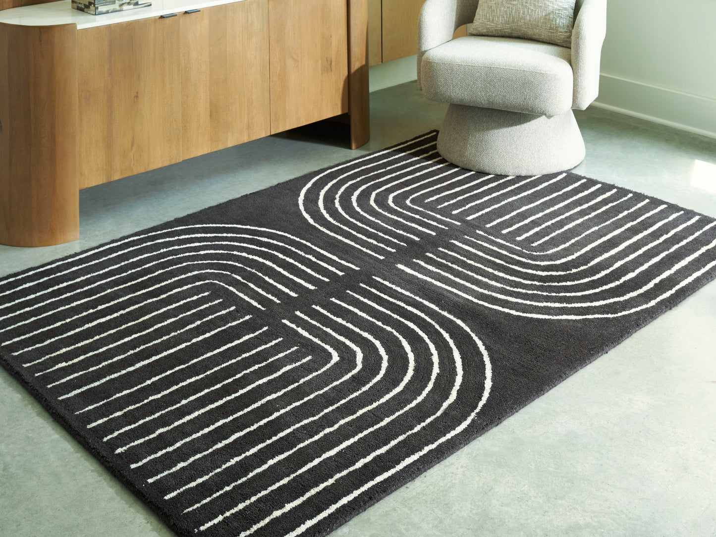 Pines Furniture Outlet - Ashley Furniture - Eldonmore Rug - 5' x 7' Area Rug / Black/Ivory - R407572