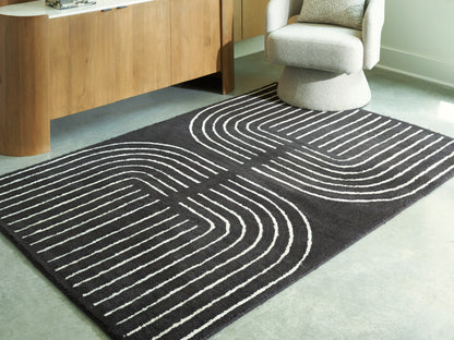 Pines Furniture Outlet - Ashley Furniture - Eldonmore Rug - 5' x 7' Area Rug / Black/Ivory - R407572