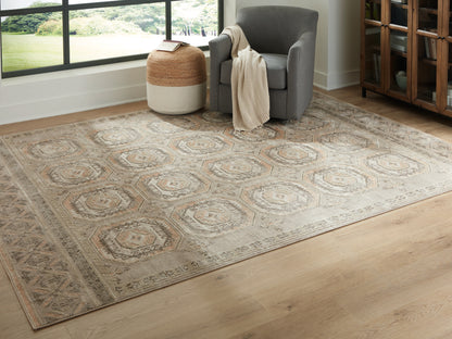 Pines Furniture Outlet - Ashley Furniture - Bachby Rug - 7'10" x 10' Area Rug / Multi - R407681