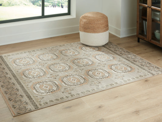 Pines Furniture Outlet - Ashley Furniture - Bachby Rug - 7'10" x 10' Area Rug / Multi - R407681
