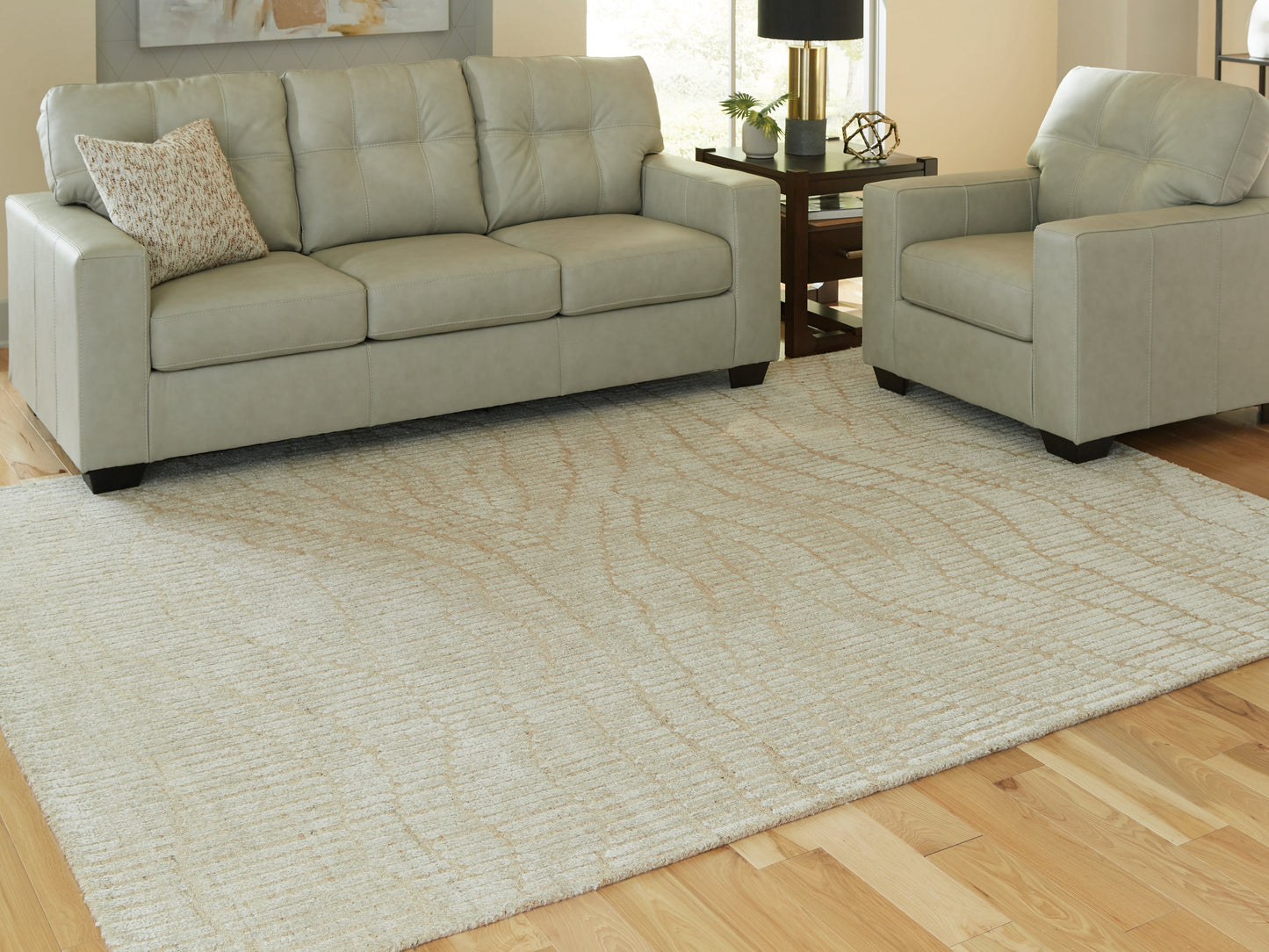 Pines Furniture Outlet - Ashley Furniture - Jaseena Rug - 7'8" x 10' Area Rug / Beige/Tan - R407721