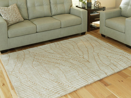 Pines Furniture Outlet - Ashley Furniture - Jaseena Rug - 5' x 7' Area Rug / Beige/Tan - R407722