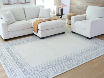 Pines Furniture Outlet - Ashley Furniture - Azelhurst Rug - 5' x 7' Area Rug / Blue/Ivory/Gray - R407852